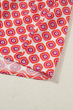 Orange Geometric Floral Print Color Block Trim Button Front Ruffle Hem Dress