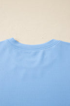 Light Blue Textured Bodice Contrast Floral Sleeve Plus Size Top