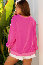 Strawberry Pink Twisted Ribbed Long Sleeve XOXO Bow Print Embroidered Patch Graphic Top