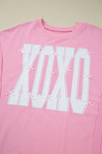 Bow Sequin XOXO Letter Graphic Exposed Seam Baggy Sweatshirt